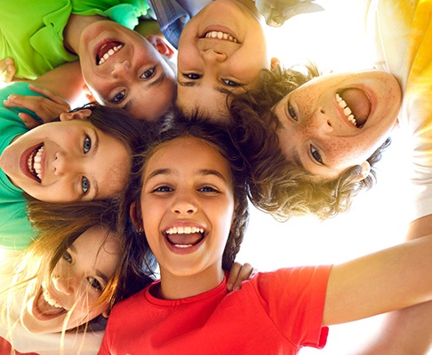 Group of happy kids in a circle