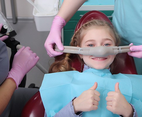 Little girl receiving nitrous oxide