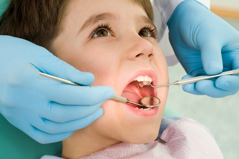 Young patient getting dental fillings