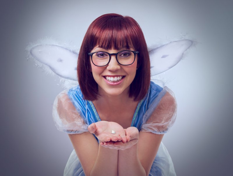 woman dressed up as the Tooth Fairy