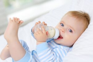 Baby drinking bottle.